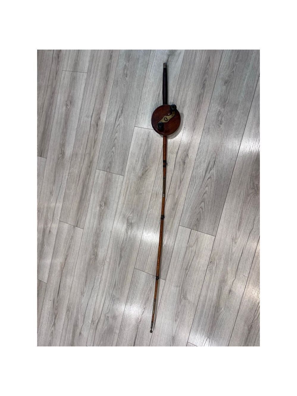 Antique wood fishing rod with Wood & Brass Spinning Fishing Reel